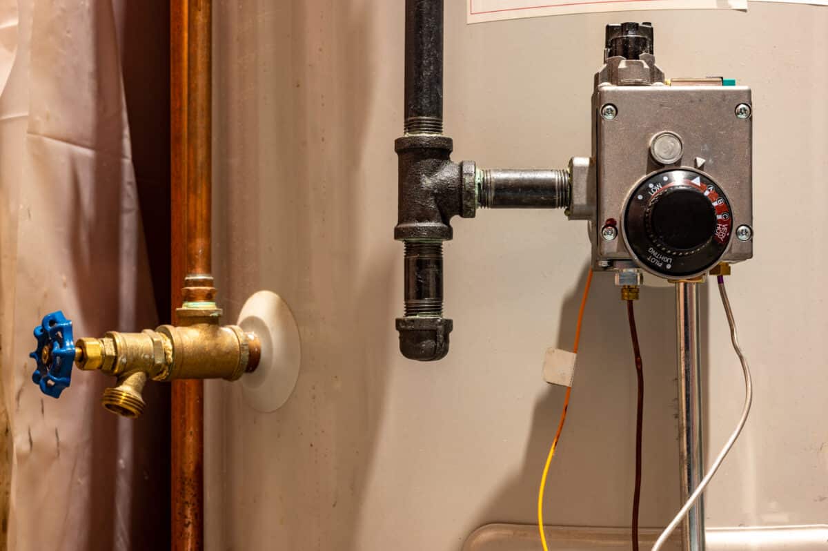 Focus on heating controls of a hot water heater with base plate on